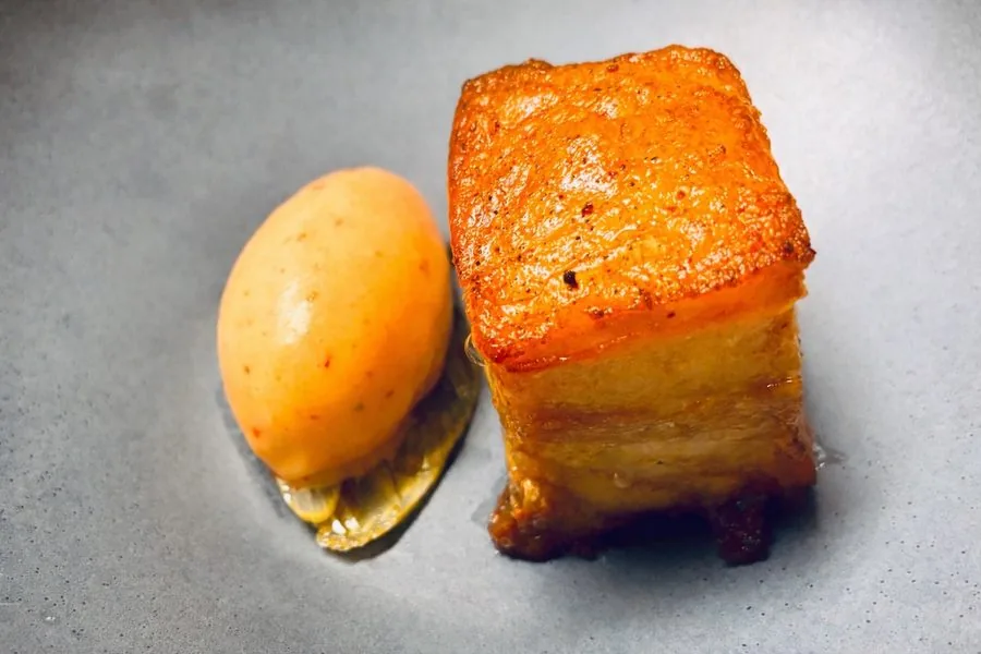 Crisp pork belly with a quenelle of sherbet at Restaurant Beck